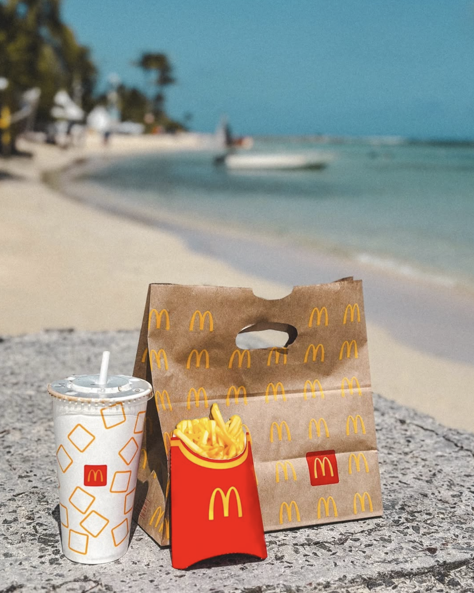 Photo of a man in a room using a tablet computer